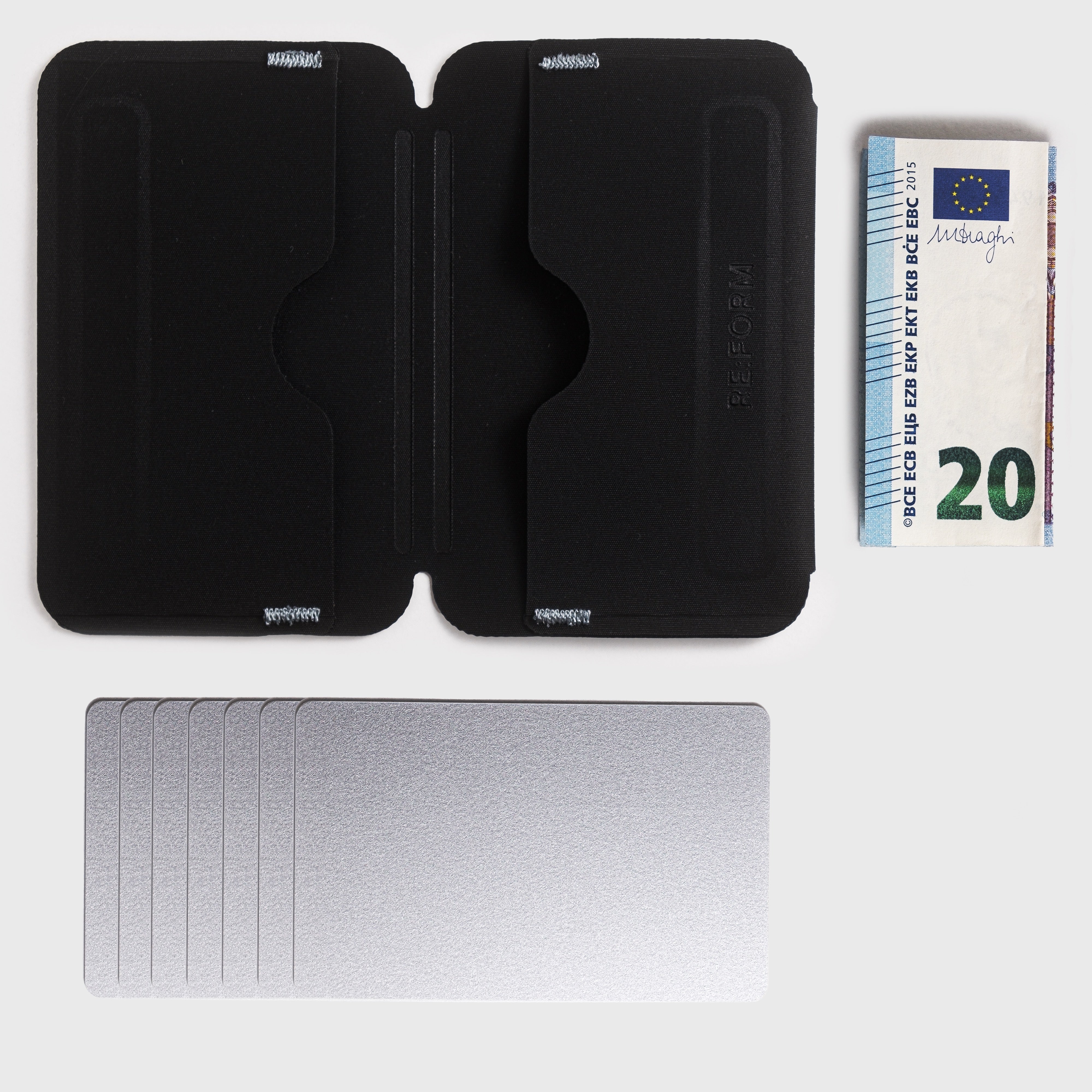 Cards and Cash fit into the RE:FORM RE:02 Minimalist Card Holder with Magnetic Closure